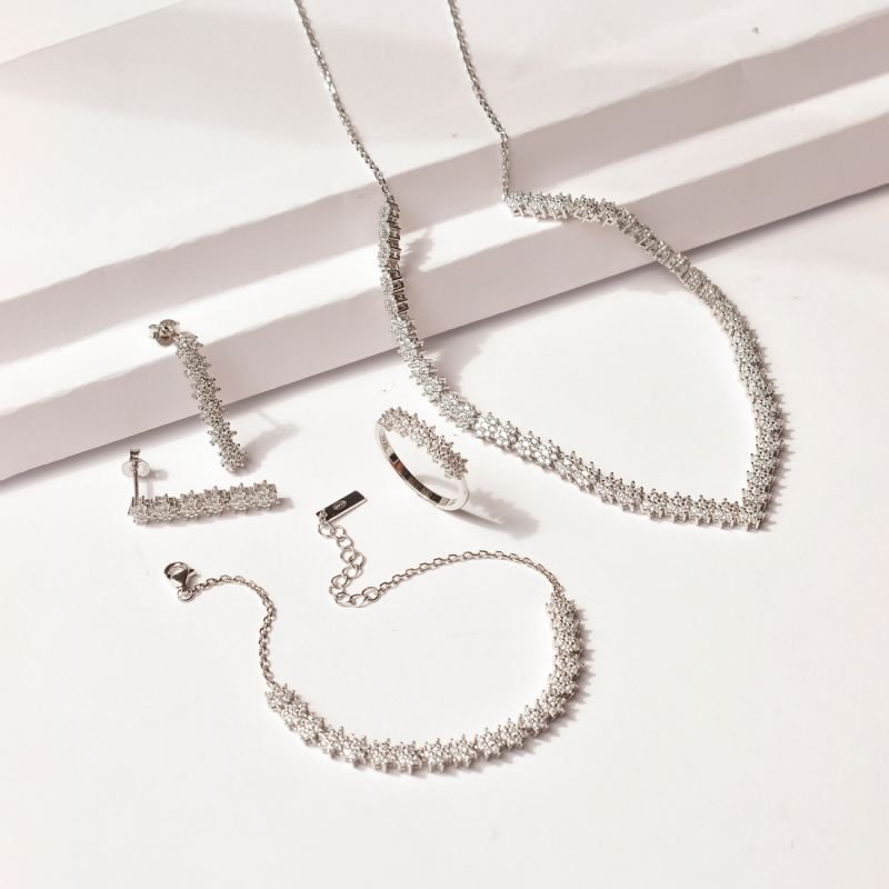 Brinco Long Florzinhas Stones