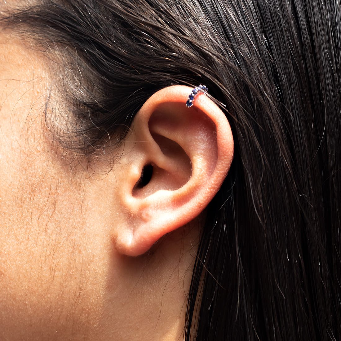 Piercing Furo Safira