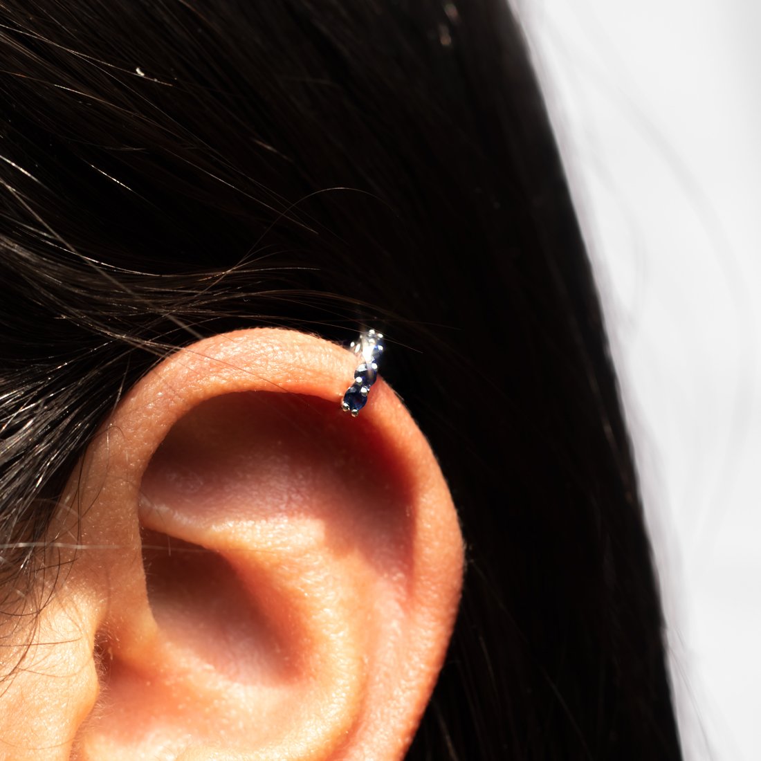 Piercing Furo Safira