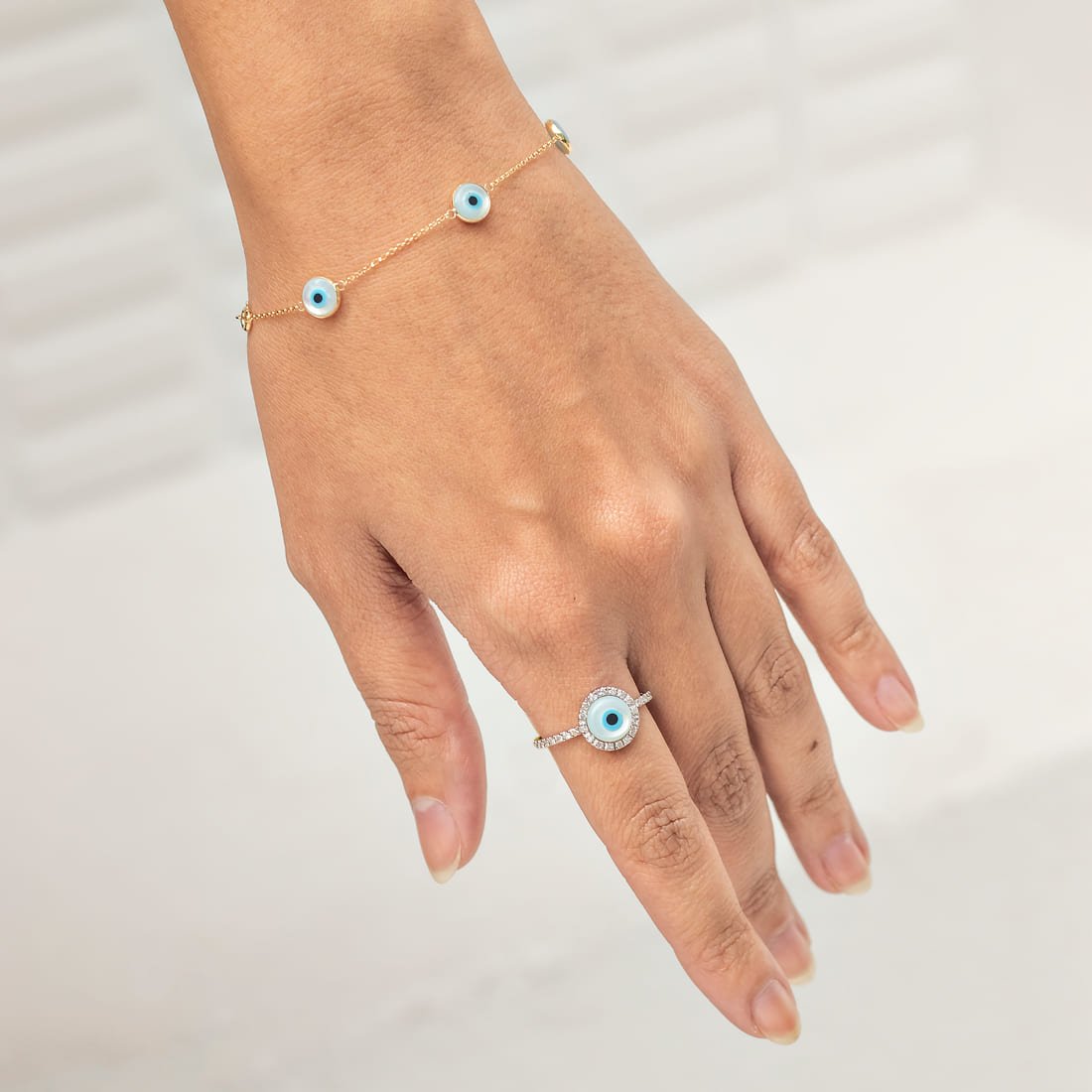 Pulseira Olho Grego Madre Pérola 