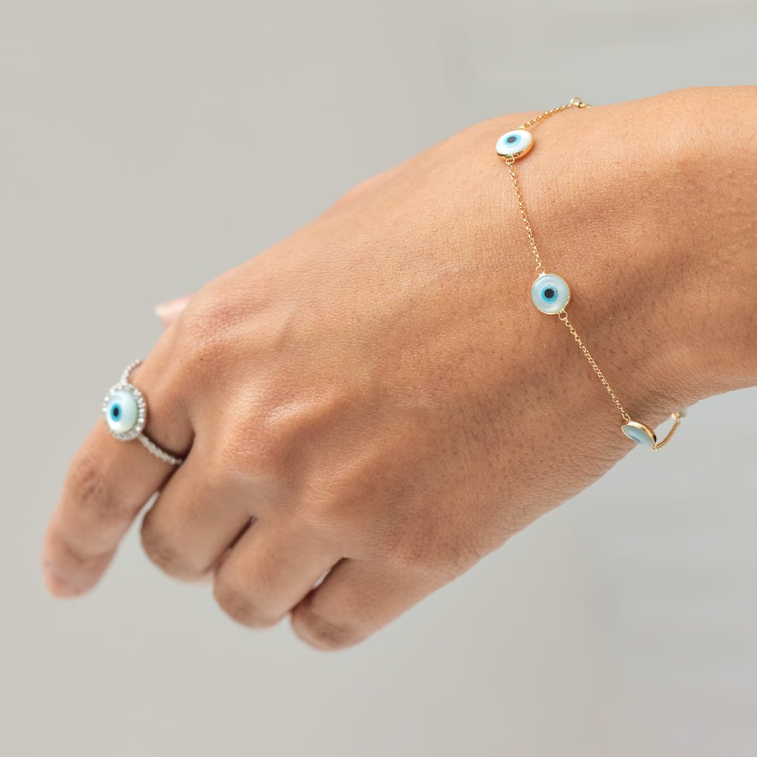 Pulseira Olho Grego Madre Pérola 